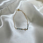 gold cross bracelet